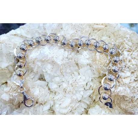 PULSERA DE PLATA 925 CON BOLAS ENTRELAZADAS CON AROS