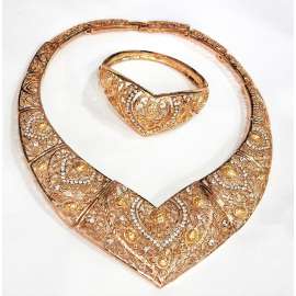 JUEGO GARGANTILLA RIGIDA Y PULSERA CON BAÑO DE ORO