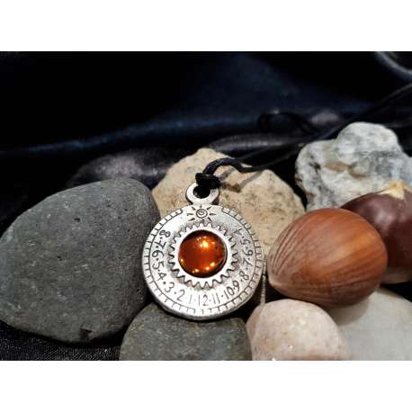 COLGANTE RELOJ SOLAR SATURNO AMBAR